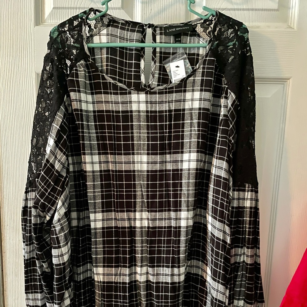 Black and white long sleeve worn lace